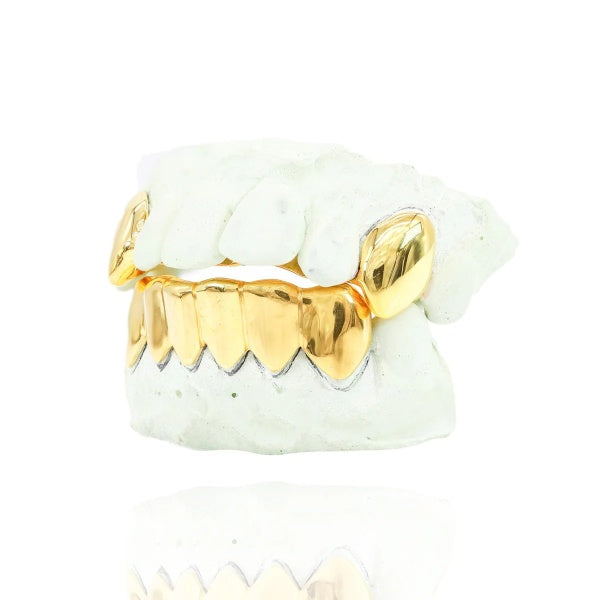 2 Teeth With Extended Fangs & 6 Bottom Gold Grillz